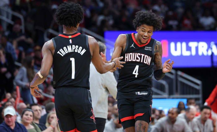 ockets guard Jalen Green (4) celebrates with forward Amen Thompson (1) after a play during the second quarter against the Washington Wizards at Toyota Center.